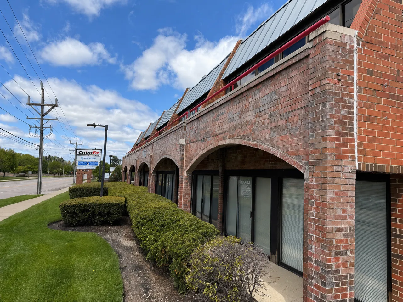 The ChiroFit building exterior with the practice sign